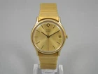 Vintage Timex Q Watch Men 34mm Date Gold Tone Stretch Band New Battery 6.75+