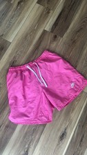 pink nike swim shorts