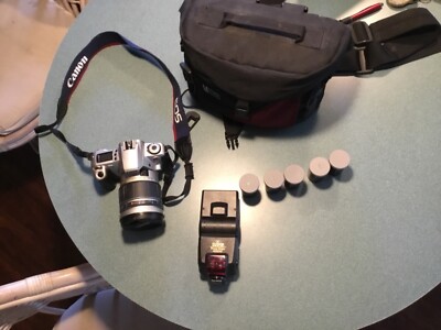 Canon EOS Rebel 2000 with  tamron 28-200mm lense & sunpak ,and bag 
