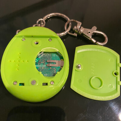 Tamagotchi Connection V1 2004 Green & Orange Plaid Matrix