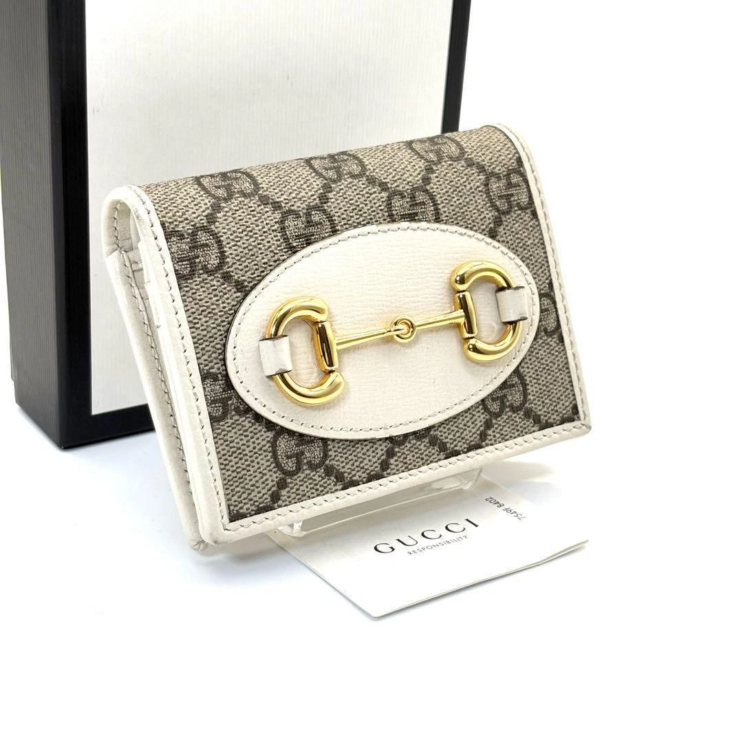 Extreme Beauty GUCCI Portefeuille Bi Pliable Mors de Cheval GG Supreme Blanc