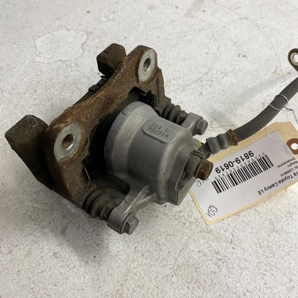 Conjunto de pinza de freno de disco lado pasajero trasero derecho Toyota Camry 2018-2021 OEM Foto 4 de 4