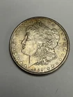 1889 $1 U.S. Morgan Silver Dollar. Heavy Toning Combine S&H