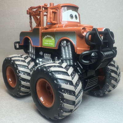 Disney Pixar Cars Deluxe Monster Truck Mater Tow Mater Offroad