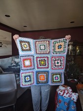 NEW hand crocheted baby blanket approximately 27X27 inches