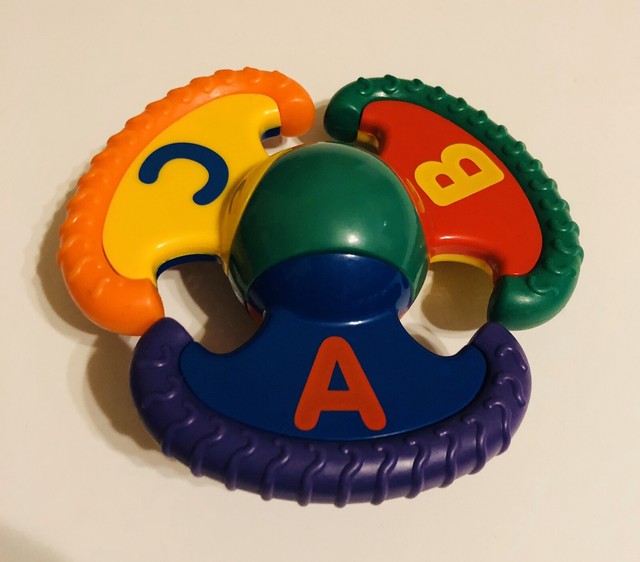 Discovery Toys Twist & Learn Rattle With Beginning Letters, Pics