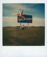 Old Vintage Photo COLOR POLAROID TRIO MAN WOMAN BABY OKLAHOMA HIGHWAY SIGN
