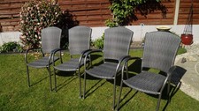 4 Rattan effect stackable garden chairs