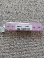 Boite à pilules en plastique rose neuve dans son emballage 