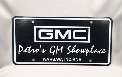 Bruce Petro's GMC GM Showplace Warsaw IN Auto Car Dealer Booster License Plate
