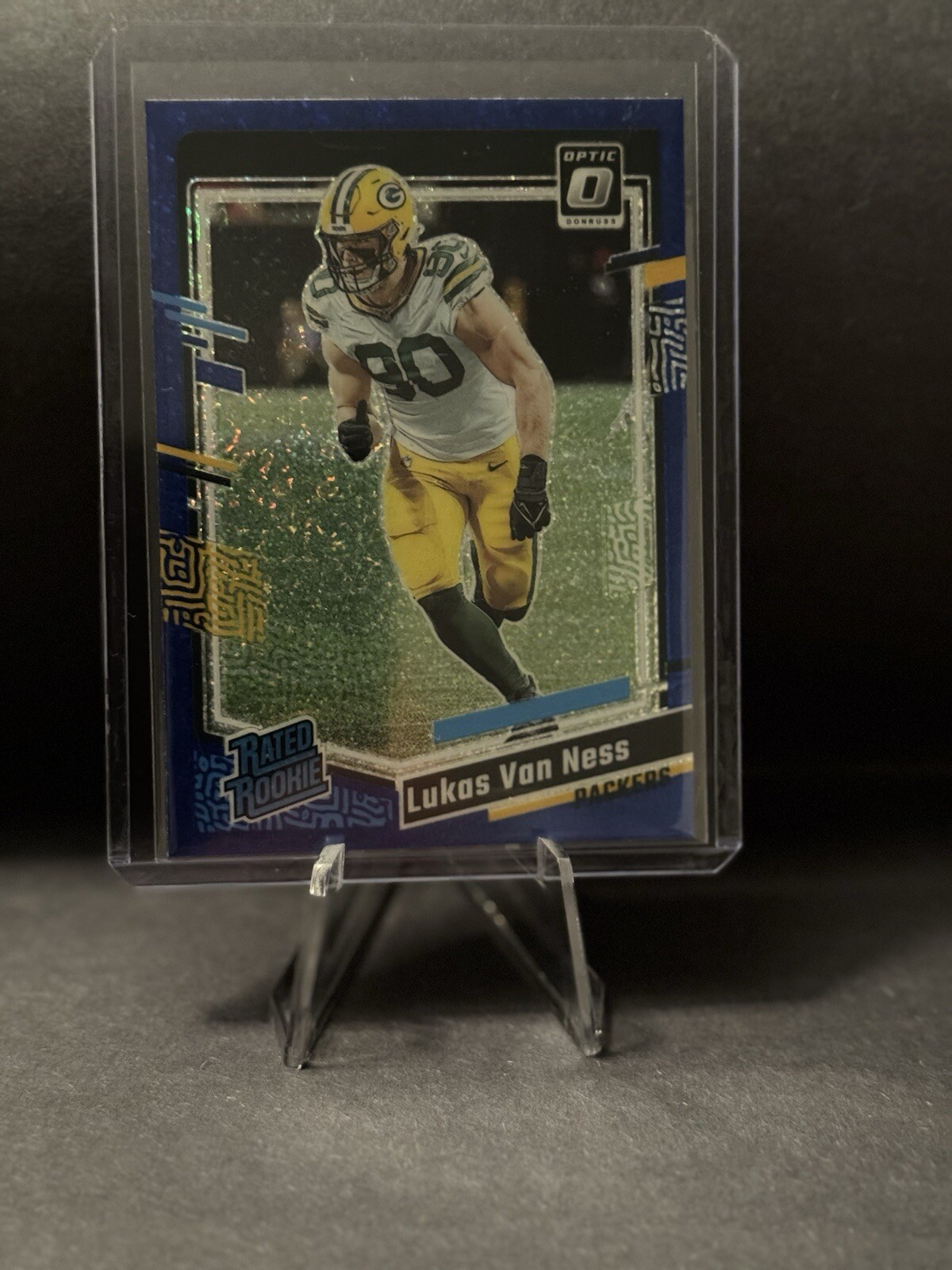 2023 Panini Donruss Optic - Rated Rookie Blue Glitter Prizm #240 Lukas Van Ness