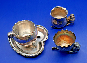 THREE ANTIQUE SILVERPLATED CHICKEN TOOTHPICK HOLDERS