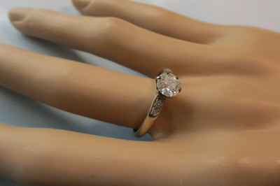 Diamond, 0.73 carats, 14k engagement ring with semi-cathedral setting Size 8.25