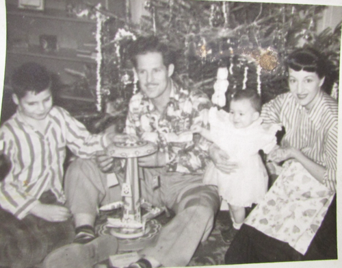 Vintage 1950s Christmas Photo - PUTTING TOGETHER THE TOY ON CHRISTMAS MORNING - Picture 2 of 3