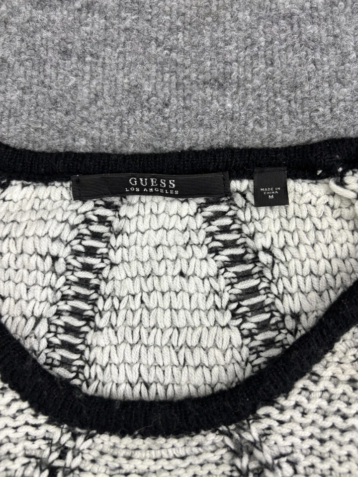 Suéter Guess Mujer Gris Medio Negro Tejido Pullover Manga Larga Alto Bajo Dobladillo Foto 2 de 4