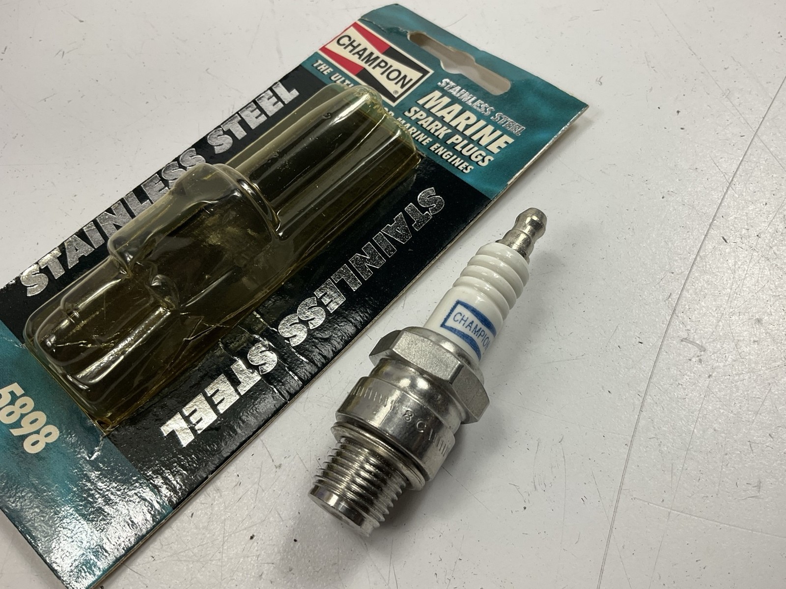 Champion 5898 STAINLESS STEEL Marine Spark Plug QL76V, 827M L76V