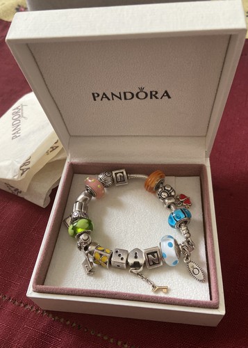 Authentic bracelet with 17 pandora charms Spacers 925 Bracelet 7” |