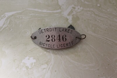 AS FOUND, VINTAGE DETROIT LAKES BICYCLE LICENSE NO. 2846 WITH WIRE TIE