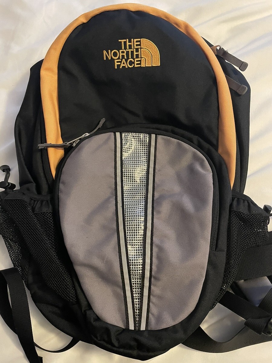 The North Face Cato's Logo Small Black & Gold Backpack | eBay