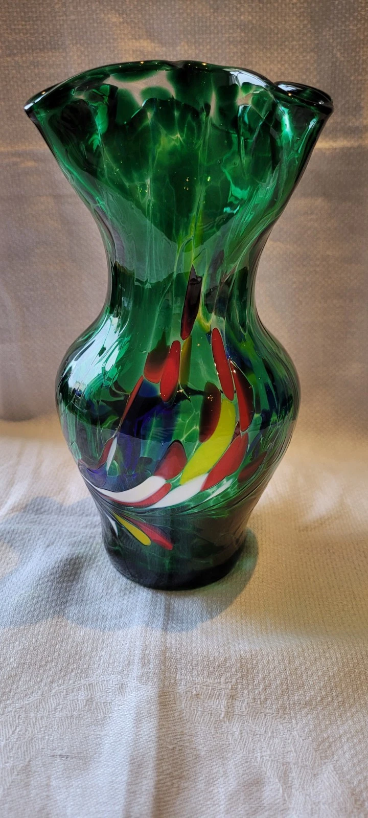 Murano style art glass vase green & multi colour splashes 8” tall ruffle top
Opens in a new window o