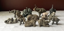 Lot of 13 Vintage Miniature Elephant Figurines, Largest 3 1/4 T x 4 L