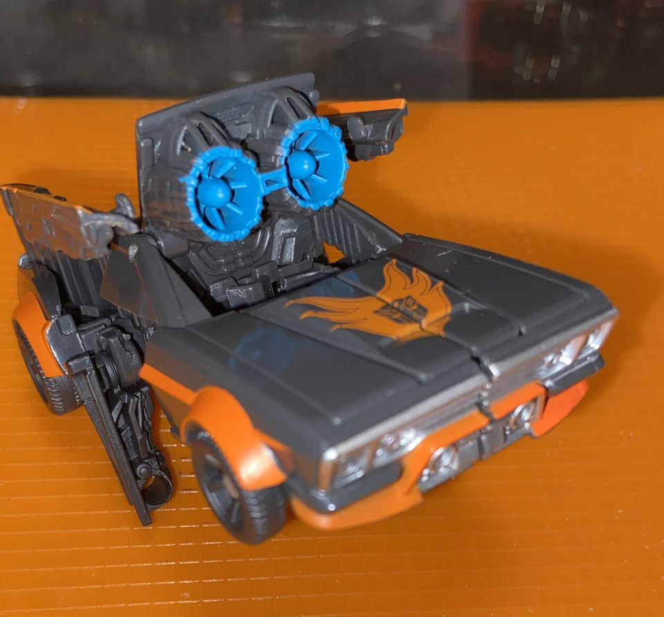 Figura de acción de robot Hasbro Tomy Transformer negro naranja de colección coche de carreras raro Foto 2 de 4