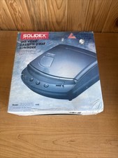 Video Cassette Solidex VHS rebobinadora bidireccional modelo 7000XT en caja