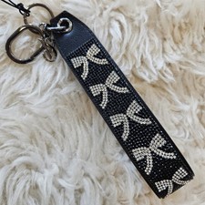 Victoria's Secret sparkle wristlet strap keychain in Black Bows