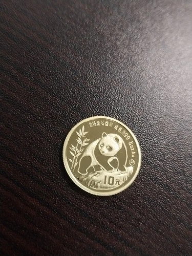 1990 Chinese Gold Panda 1/10 oz — photo from the most recent tracked eBay sale