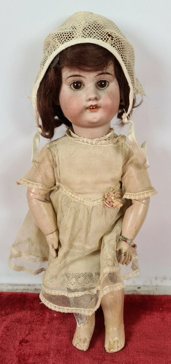DOLL. PORCELAIN HEAD. COMPOSITION BODY. JUMEAU XIX XX CENTURY