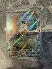 Meowth 106/094 Me02: Phantasmal Flames Holo