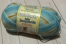 one full skein Bernat Baby Jacquards Florals yarn Bluebell 06201
