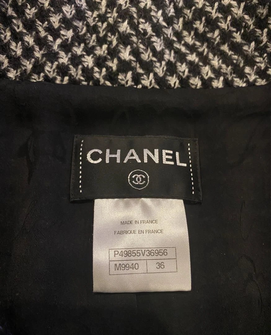 Giacca cappotto tweed monotono Chanel leone bottone cocco