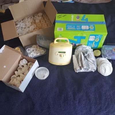 medela symphony breast pump 2.0 + bottles + parts