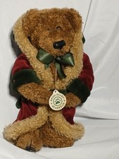 A Boyds Bears plush teddy bear dressed as Santa Claus.