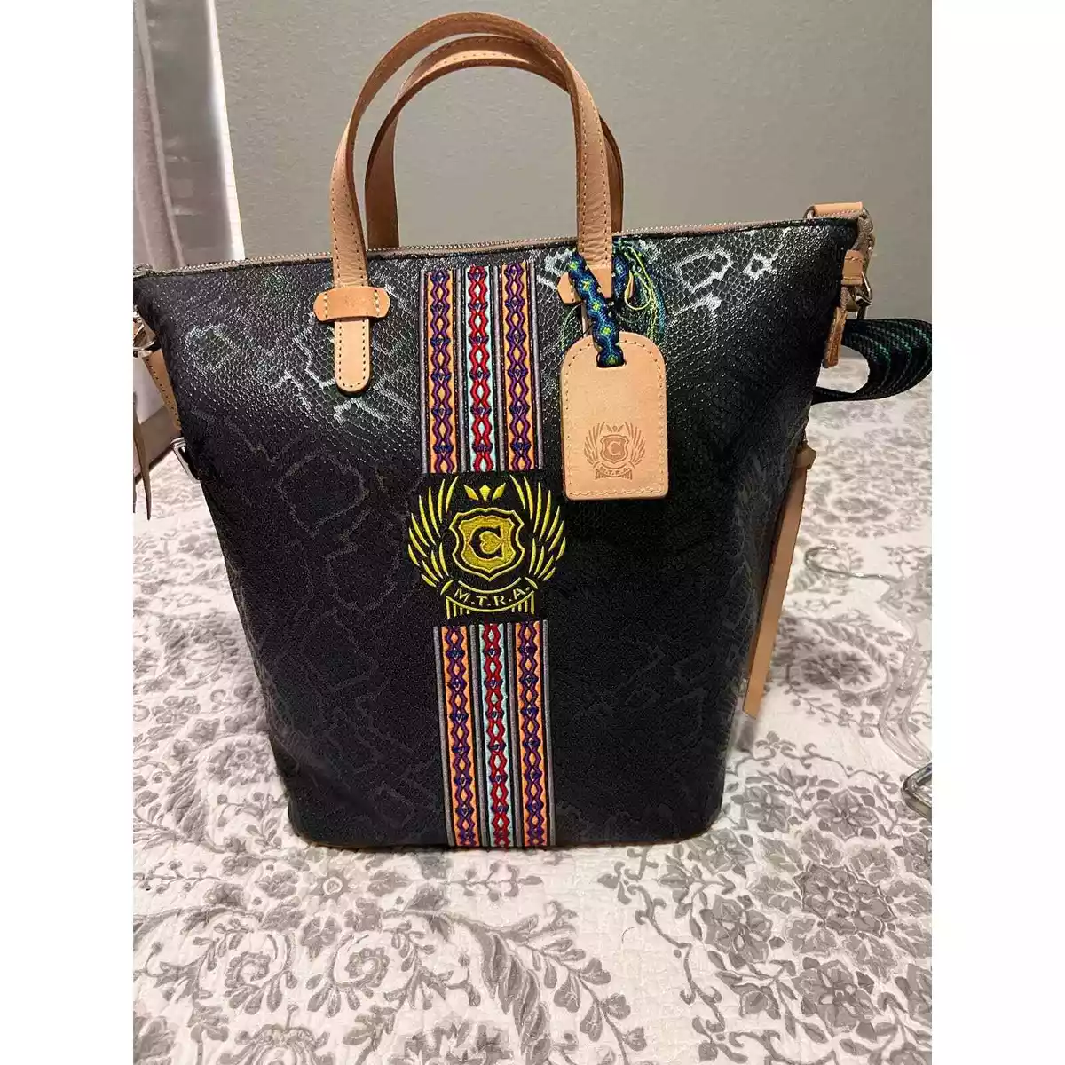 Retired Consuela sling crew purse NWT Randal embossed snake print