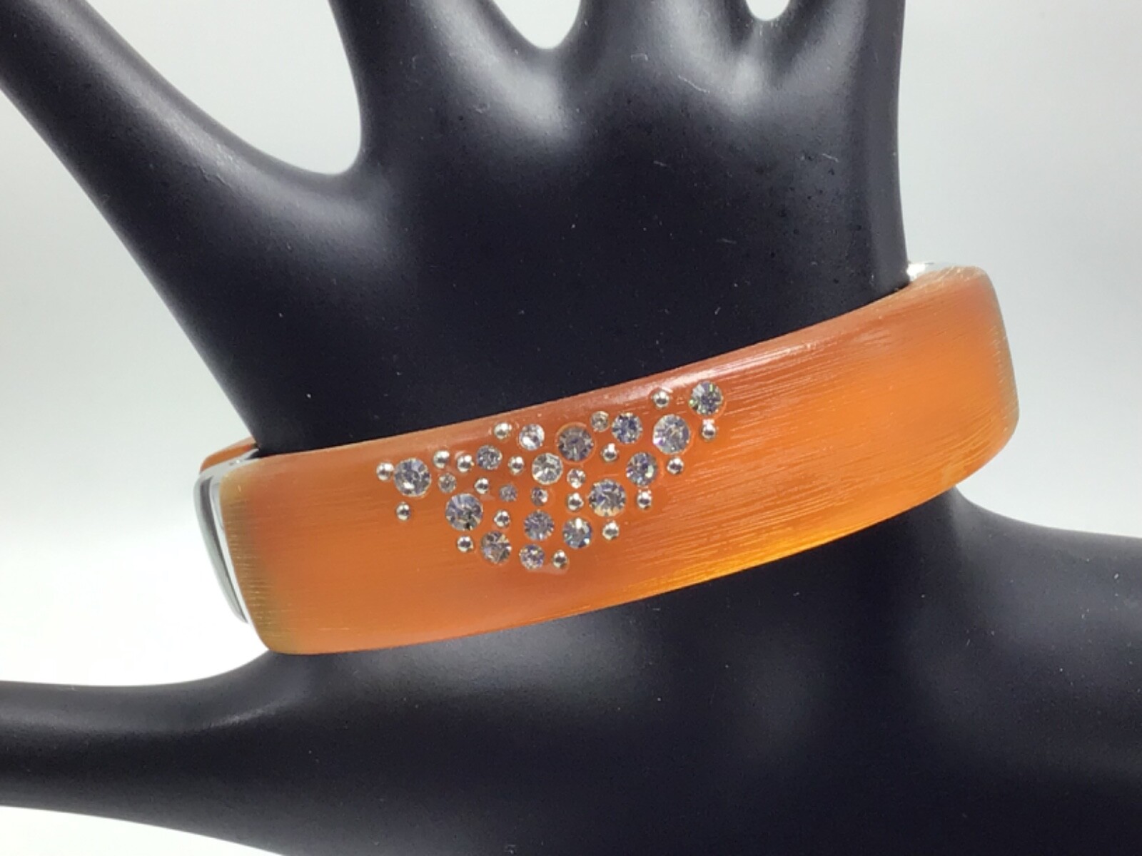 ORANGE PLASTIC HINGE BANGLE BRACELET WITH CRYSTAL… - image 1