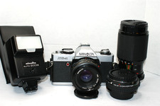 Minolta XG-A SLR With 2 Lenses And A Flash
