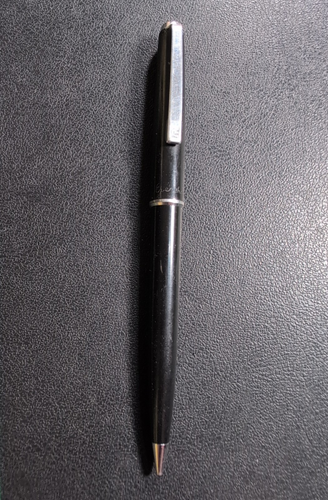 Black Eversharp mechanical pencil with silver tone trim, made in USA, twist action, and engraved oval logo on side.
