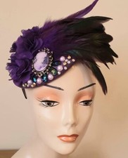 hats and fascinators. Purple hatinator with jewels and feathers. Wool percher.