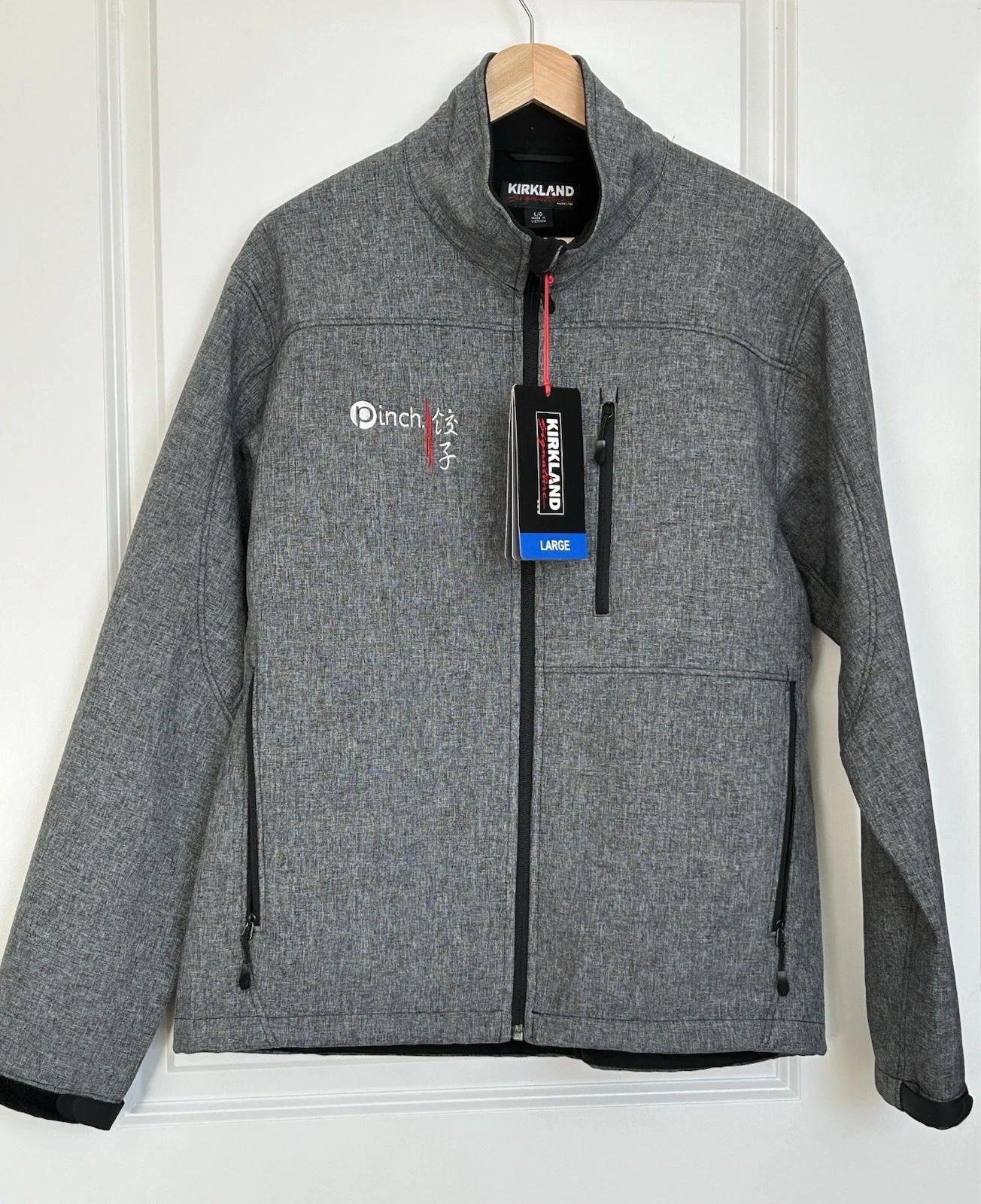 New Kirkland Signature men's softshell jacket With zipper pockets