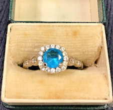 BEAUTIFUL BLUE ZIRCONIA WITH CLEAR CZ ACCENTS STERLING SILVER HALO RING SZ. 6.5