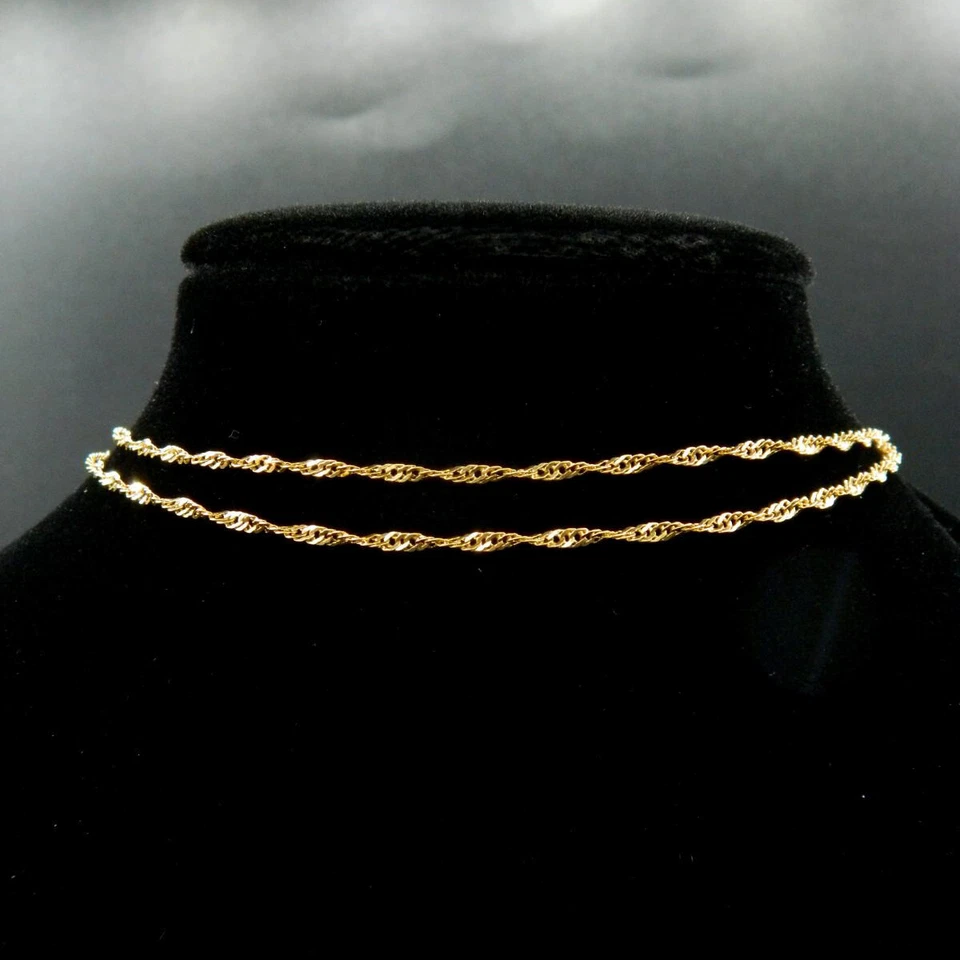 O883 -Chaîne Or jaune 18k -Maille Singapour de 2,75 x 1,65 mm - Longueur 48,5 cm