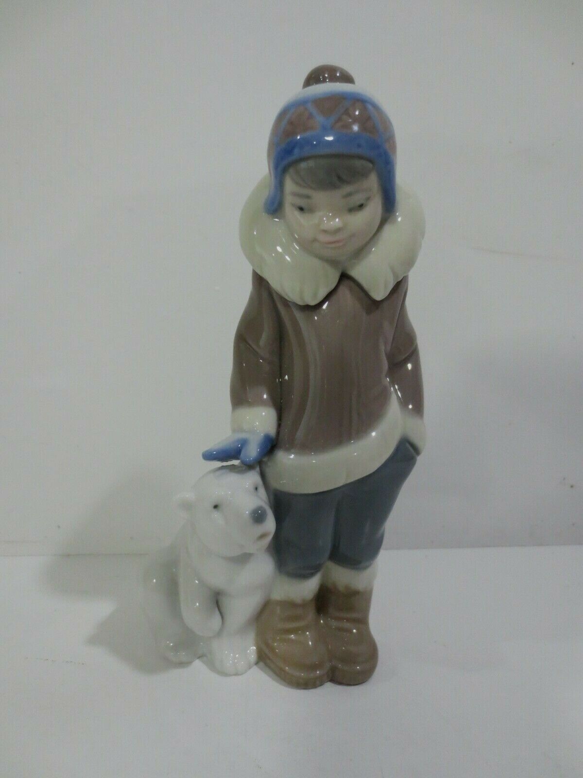 lladro eskimo boy with polar bear cub