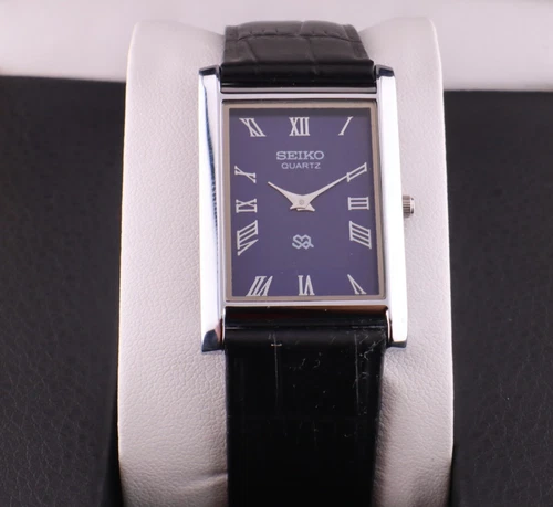 Vintage Seiko Slim Quartz Men's Wrist Watch Blue Dial with Black Strap.