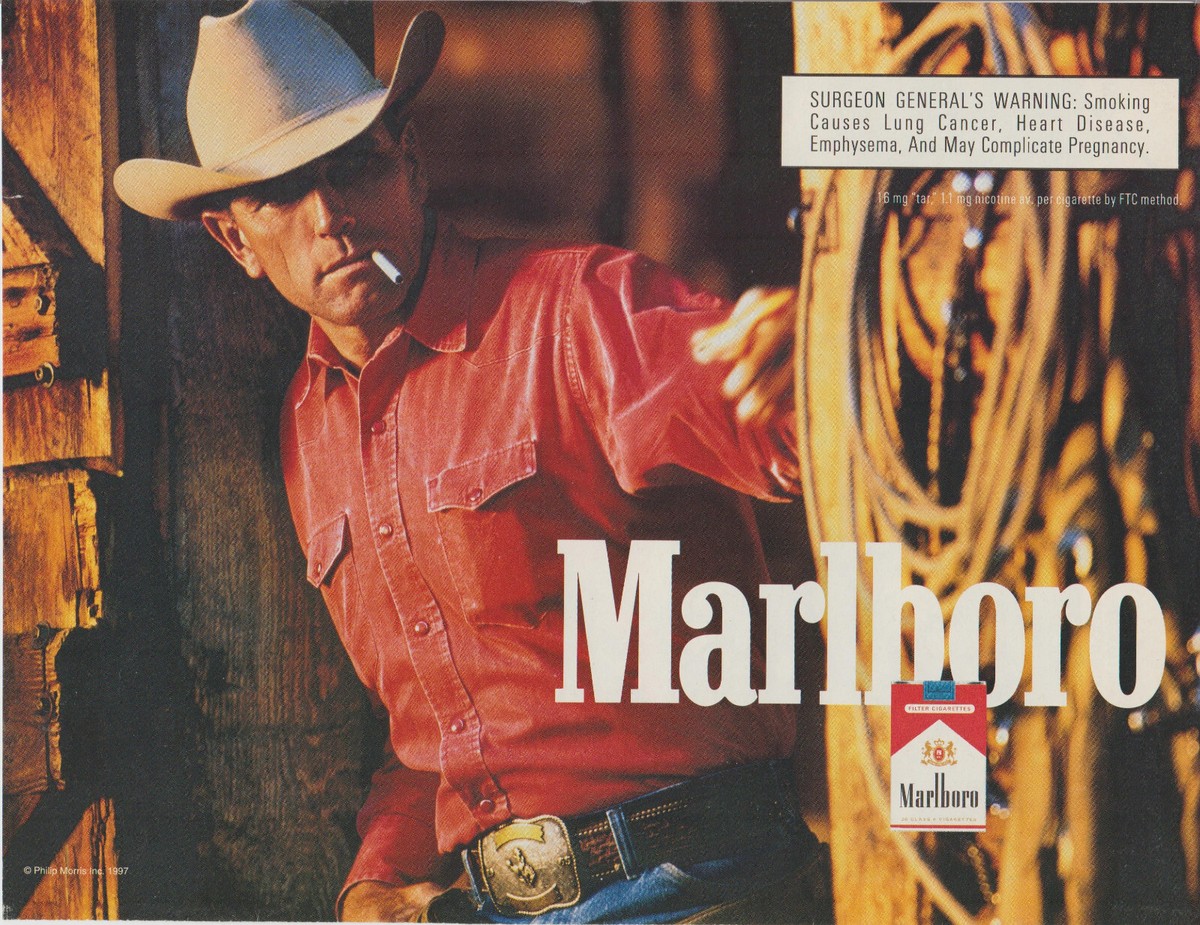1997 Marlboro Cigarettes - Smoking Cowboy Stands Watch Rope