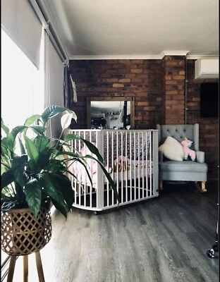 grey cot and change table