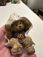 Halloween Bear Figurine Holding A Ghost Costume