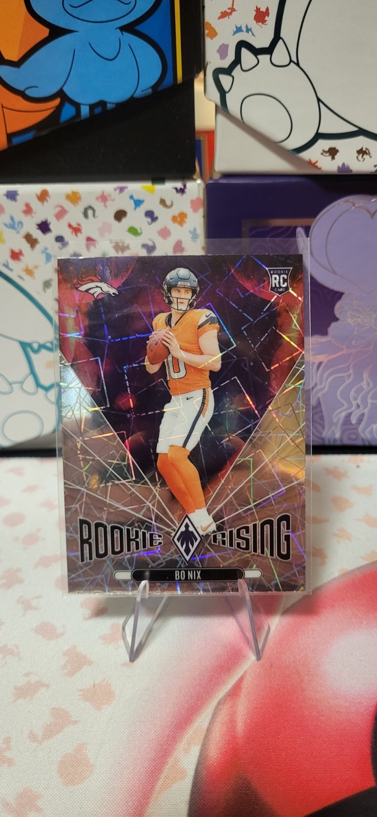 2024 Panini Phoenix - Rookie Rising Bo Nix #RR-BNX Lazer (RC)