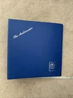 STAMPS - THE AMBASSADOR ‘ STUART ‘ FDC ALBUM - 4 RING - 12 PAGES - BLUE  - PRE O